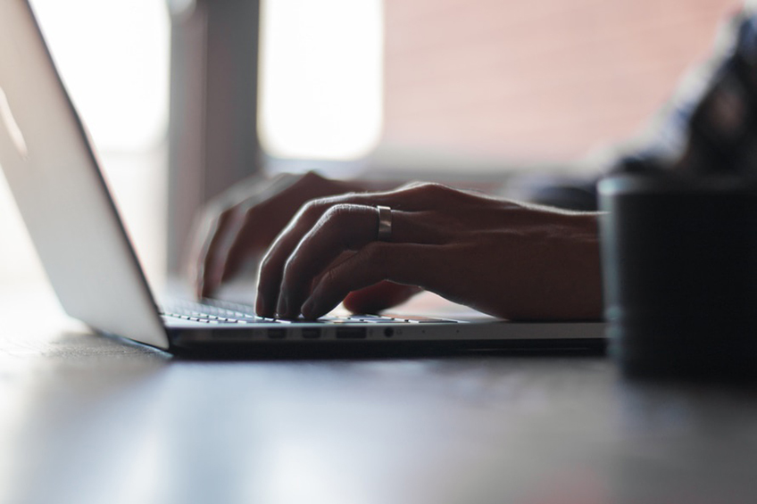 man using laptop